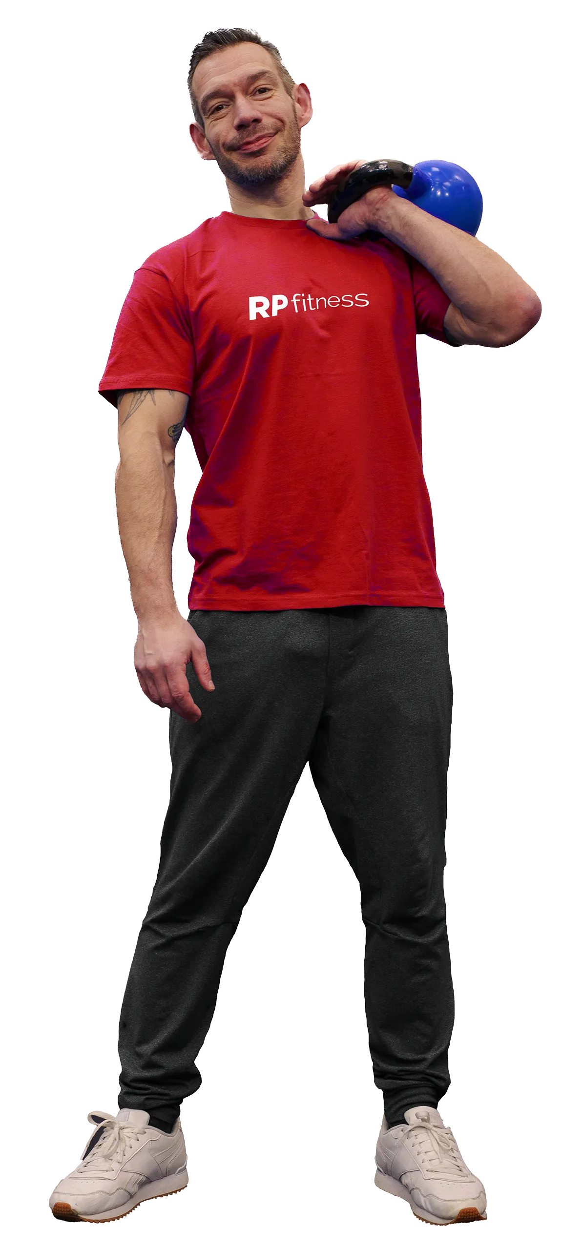 Richard Patman, founder of RP Fitness, holding a kettlebell